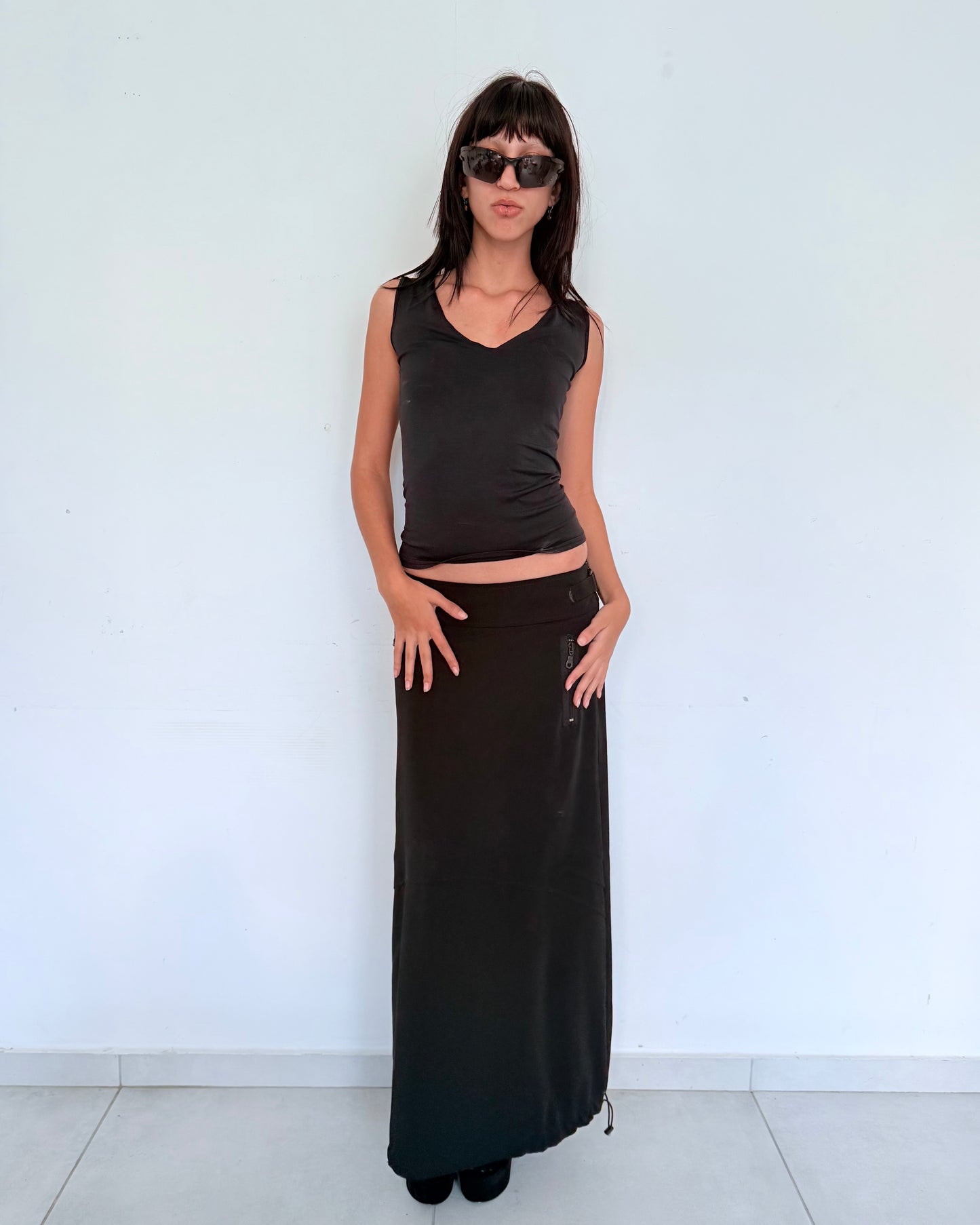 Black Sleeveless Top with Draped Cutout Back